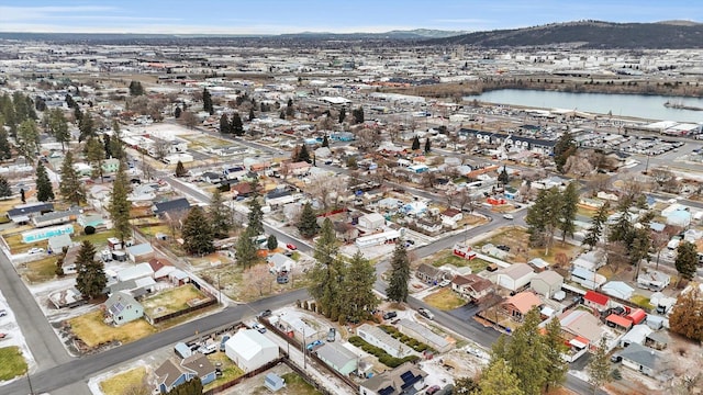 bird's eye view with a water and mountain view