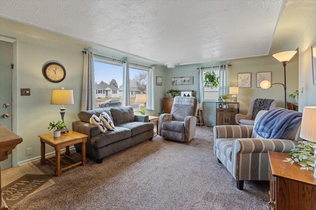 living room with carpet floors and a textured ceiling