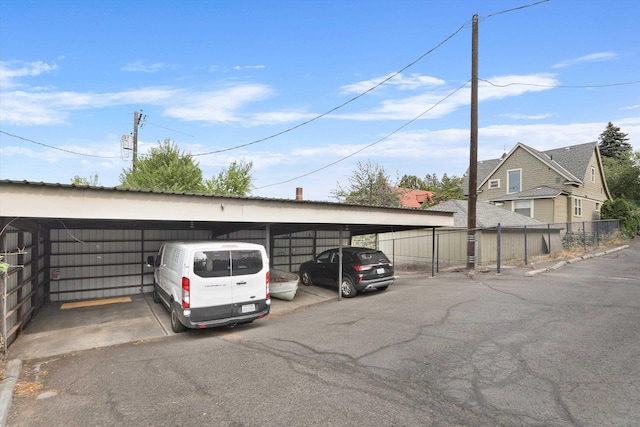 view of parking with a carport