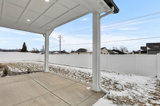 view of snow covered patio