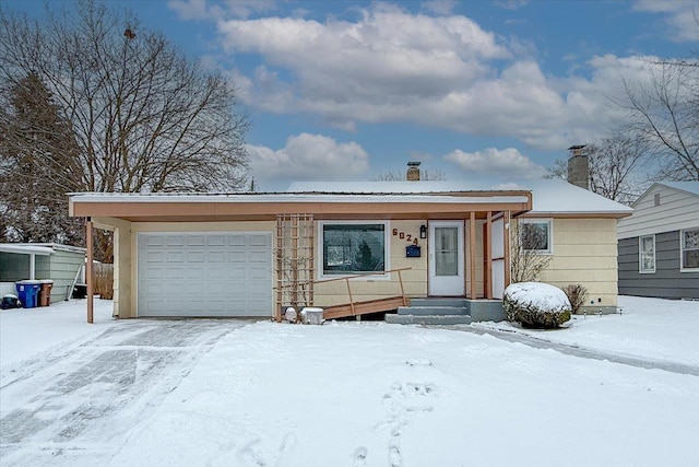 ranch-style house with a garage