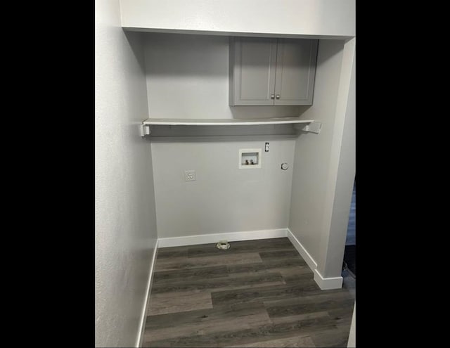 laundry room featuring gas dryer hookup, dark hardwood / wood-style flooring, cabinets, washer hookup, and hookup for an electric dryer