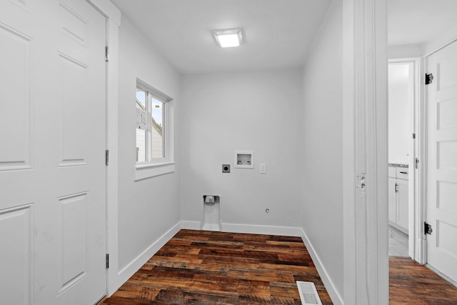 laundry room with electric dryer hookup, washer hookup, and dark wood-type flooring