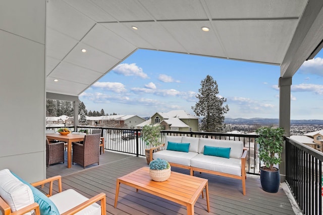 wooden deck with outdoor lounge area