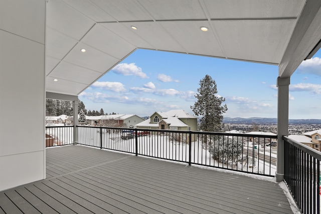 view of snow covered deck