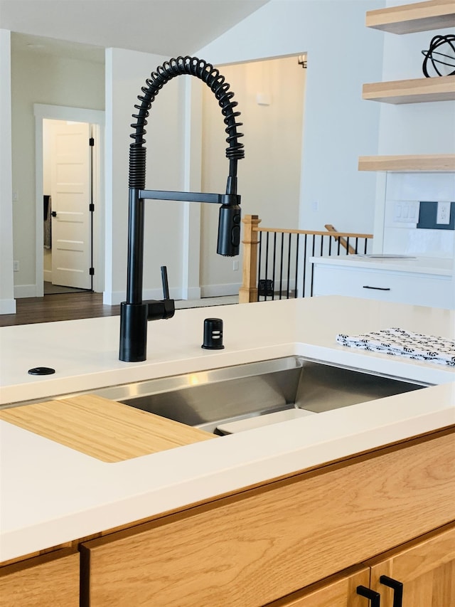 details featuring light brown cabinetry