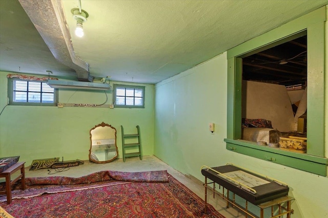 basement with a textured ceiling