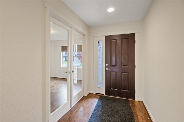 entryway featuring dark wood-type flooring