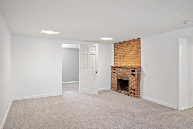 basement featuring carpet floors and a fireplace