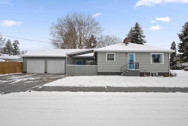 ranch-style house featuring a garage