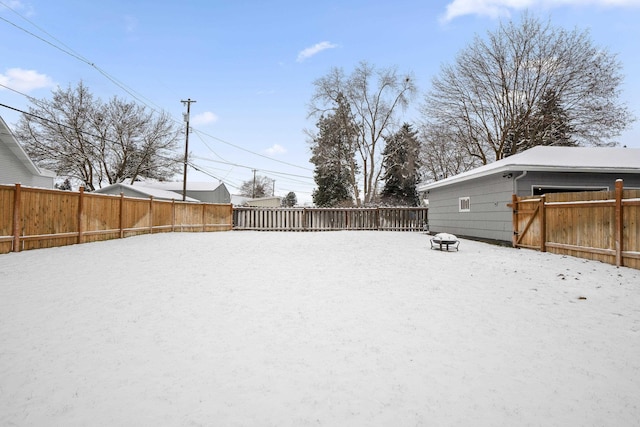 view of yard covered in snow