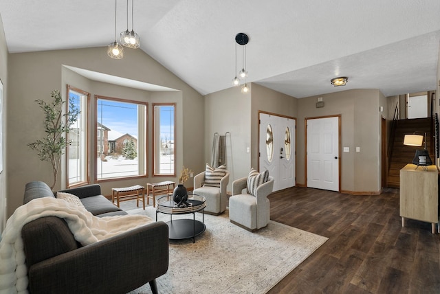 living room featuring vaulted ceiling and dark hardwood / wood-style flooring