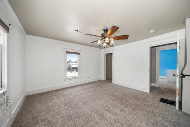 interior space featuring carpet, ceiling fan, and a closet