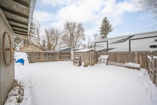 view of yard layered in snow