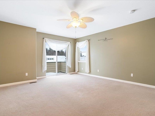 854 S Shelley Lake Ln, Spokane Valley, WA 99037 - unfurnished room with carpet floors, baseboards, and a ceiling fan