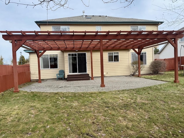 854 S Shelley Lake Ln, Spokane Valley, WA 99037 - back of house with entry steps, a pergola, fence, and a lawn