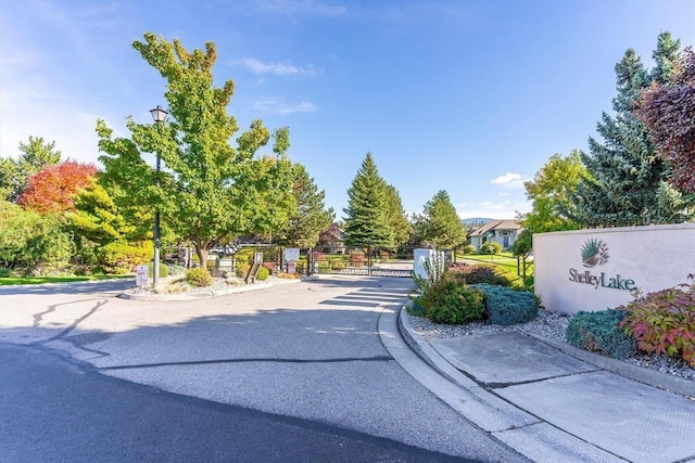 854 S Shelley Lake Ln, Spokane Valley, WA 99037 - view of street featuring curbs, a gated entry, and a gate