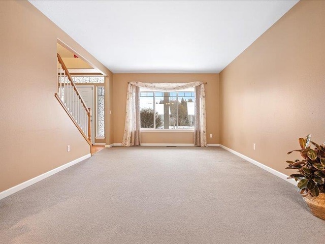 854 S Shelley Lake Ln, Spokane Valley, WA 99037 - carpeted empty room with stairs and baseboards