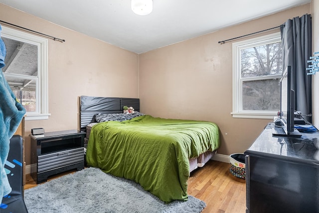 bedroom featuring hardwood / wood-style floors