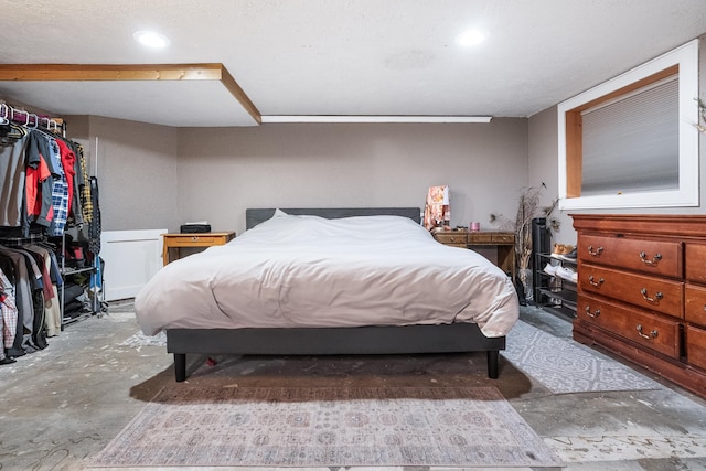 bedroom with concrete flooring