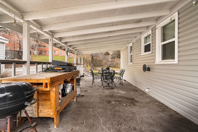 view of patio / terrace featuring area for grilling and an outdoor bar