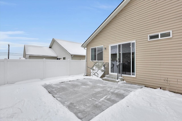 view of snow covered patio