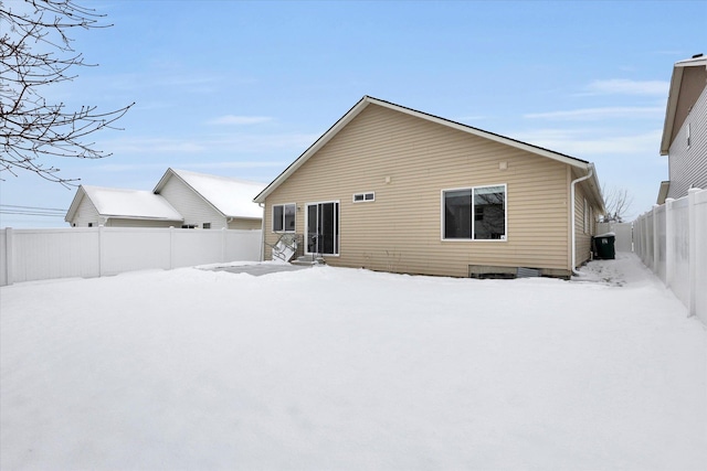 view of snow covered property