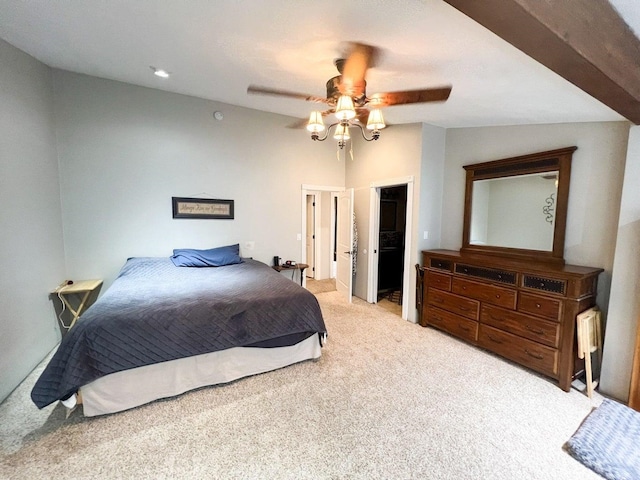 carpeted bedroom with radiator and ceiling fan