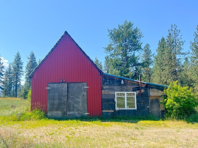 view of outbuilding featuring an outdoor structure