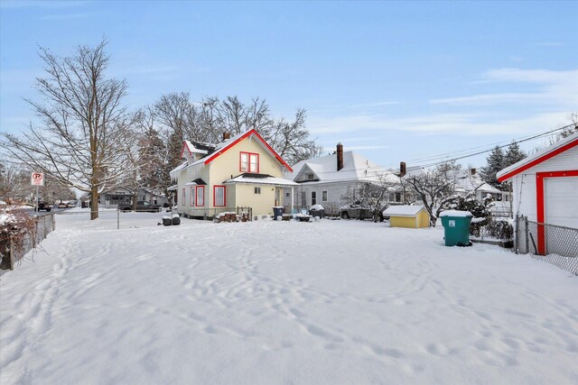 view of yard covered in snow