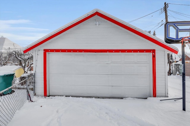 view of snow covered garage