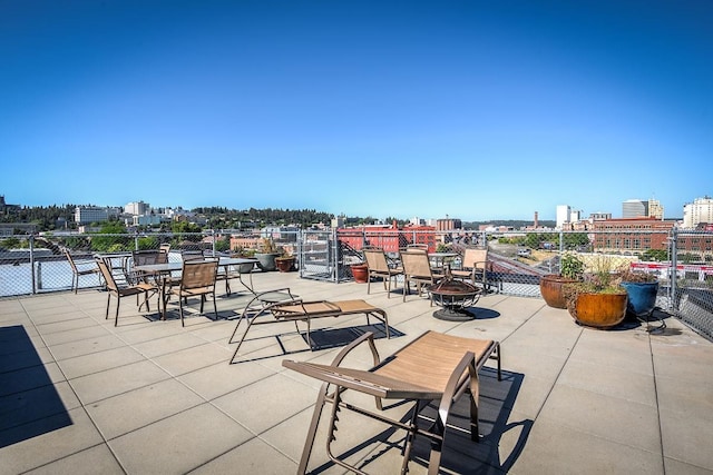 view of patio featuring a fire pit