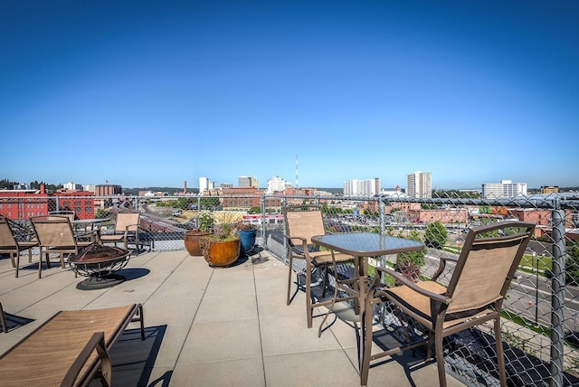 view of patio featuring a fire pit