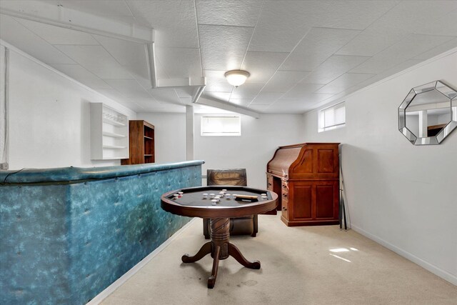 interior space with carpet and baseboards