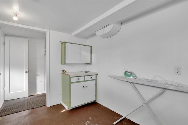 bathroom featuring concrete floors and vanity