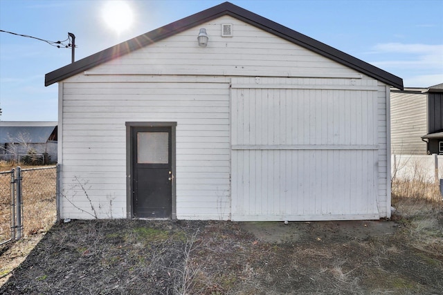 detached garage with fence