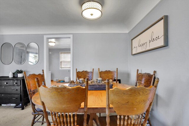 view of carpeted dining space