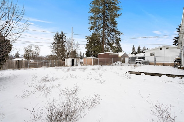 view of yard covered in snow