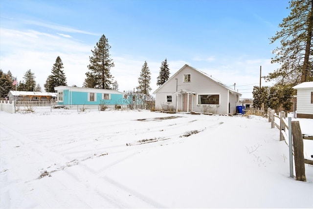 view of snow covered property