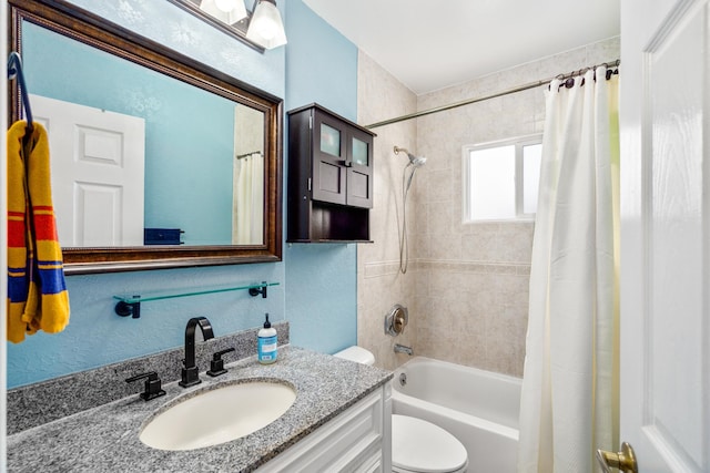 full bathroom with vanity, shower / bath combination with curtain, and toilet