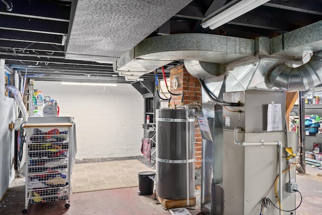 utility room with water heater and heating unit