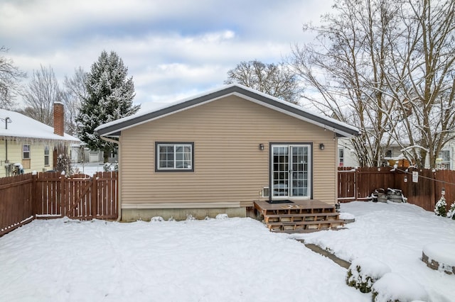 view of snow covered house