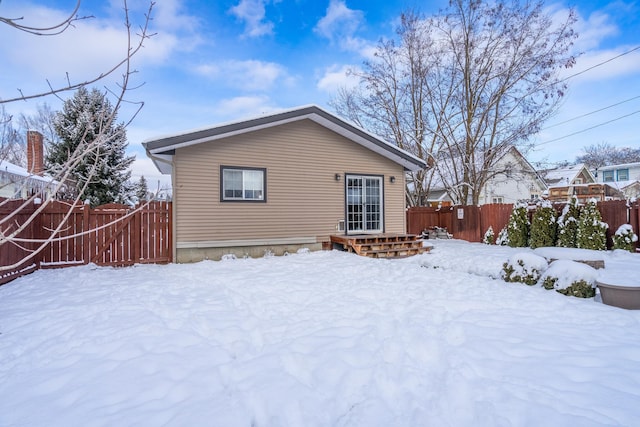 view of snow covered property