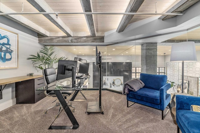 office space featuring beam ceiling, carpet floors, and wooden ceiling