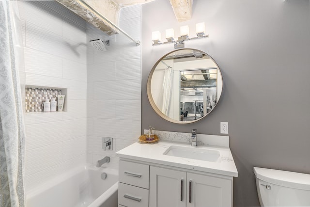 full bathroom with vanity, shower / bath combination with curtain, and toilet