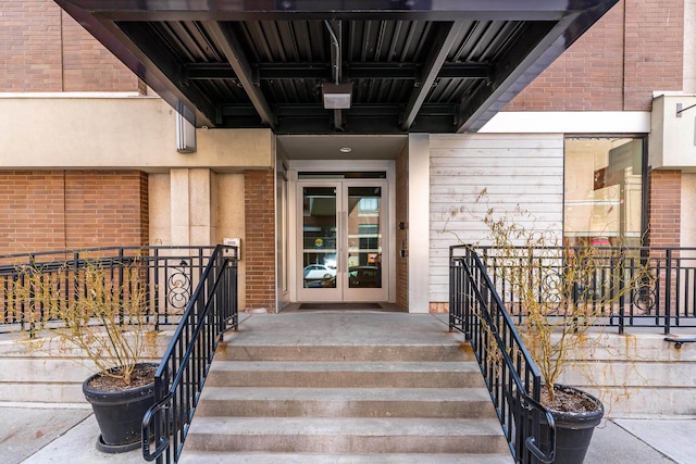 property entrance featuring french doors