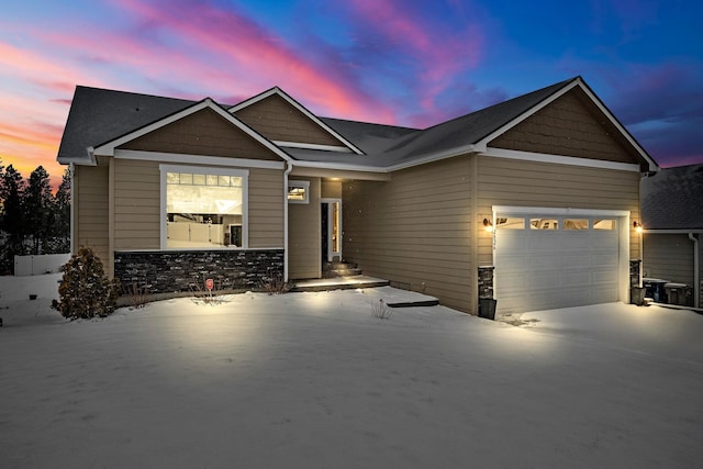 craftsman inspired home with a garage