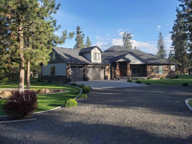 craftsman-style house with a garage and a front yard