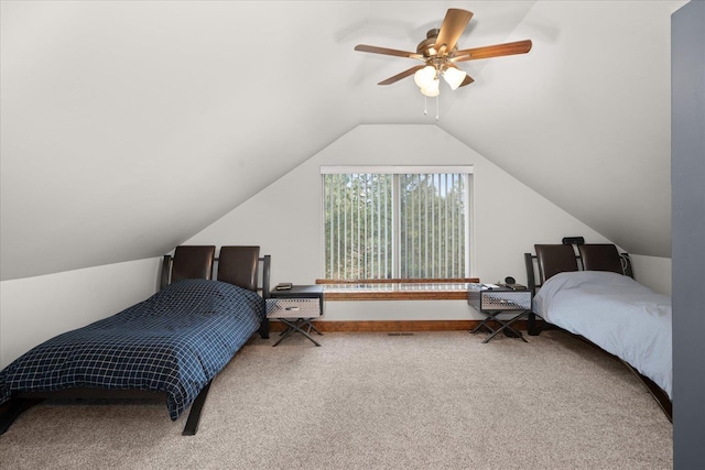 carpeted bedroom with lofted ceiling and ceiling fan