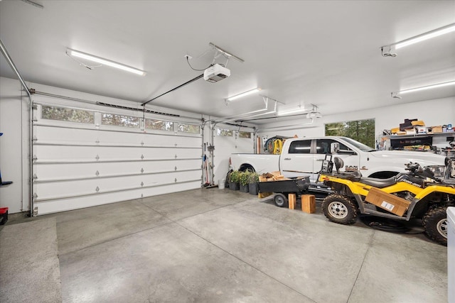 garage featuring a garage door opener